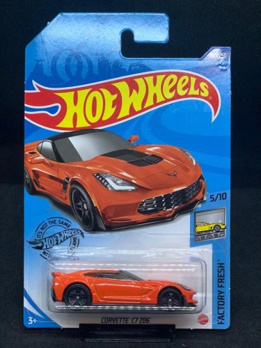 Hot Wheels - Corvette C7 Z06 orange - varianta karty: POŠKOZENÝ OBAL