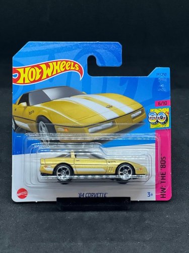 Hot Wheels - 84 Corvette C4 Gold - varianta karty: ROZTRHNUTÝ OBAL