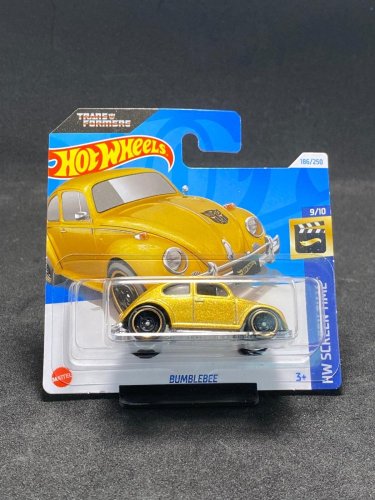 Hot Wheels - Bumblebee gold - varianta karty: POŠKOZENÝ OBAL